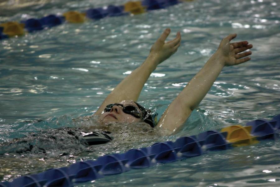 First Year Leah Davis practices the backstroke at practice before the MAC championships. MARY BOVE/THE HIGHLANDER