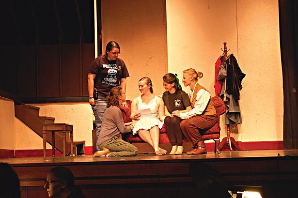 Members of the cast practice their lines during rehearsal a few days before opening night. 