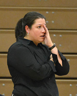 Womens basketball coach Allison Kern reacts.