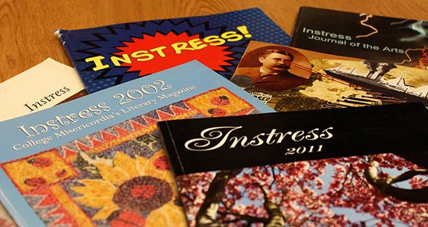 An array of past editions of Instress.  This year marks 50 years of the publication. 