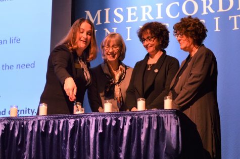 From left to right: Dr. Stacy Gallin, Dorothy Chambers, CANDLES Executive Director, Dr. Tessa Chelouche, and Dr. Susan Miller participating in the candle lighting to remember the victims of the Holocaust and medical abuse.