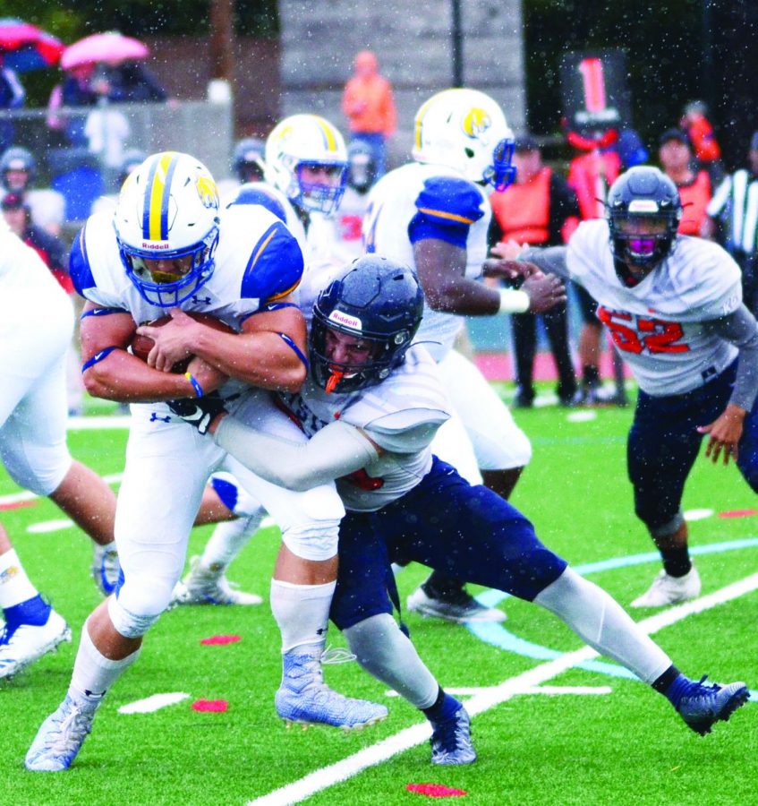 Misericordia protects the ball from the opposing team, earning another first down, during a game versus Keystone College during the fall 2019 semester. 
