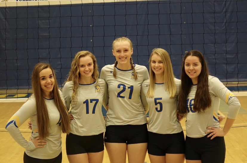 2021 Graduate Senior Vollleyball players line up for senior photo.

Left to right: Callie Mousley (Defensive Specialist), Sarah Pool (Outside Hitter), Amanda Curcio (Right Side), Mikayla Gunkle (Outside Hitter), Emily Lunny (Setter).