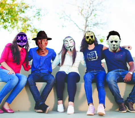 A group of students pose for a photo with their new masks on. Victor Vendetta, Cougar Care Team member, said the students’ response on the new masks has been “overwhelmingly positive.”
