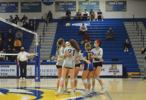 Misericordia celebrates after scoring a decisive point against Kings College.