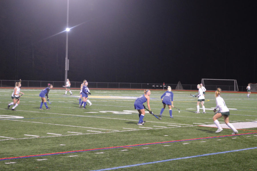 see Mikayla Cavenas (#32) clear the ball and advance it into enemy territory. 