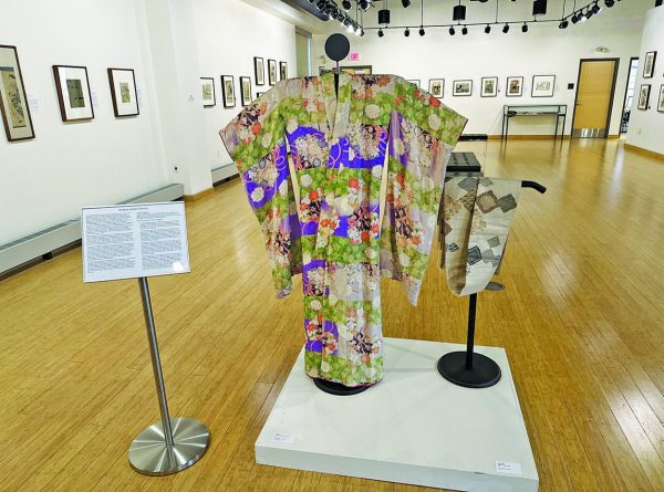 A standing display of ancient traditional Japanese clothing. 