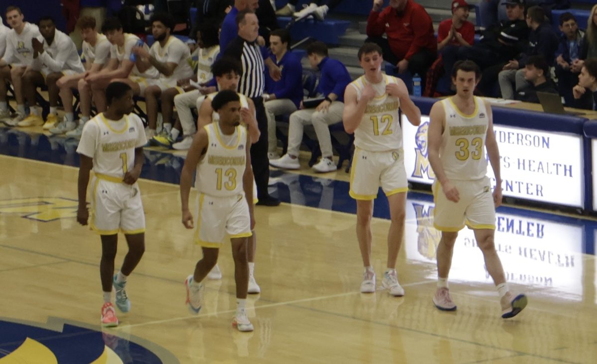 From left to right
Senior Will Anozie, Senior Arvel Chandler, Junior Eli Stoute, Junior Jack Gallagher and Senior Matt Prociak take the floor. 